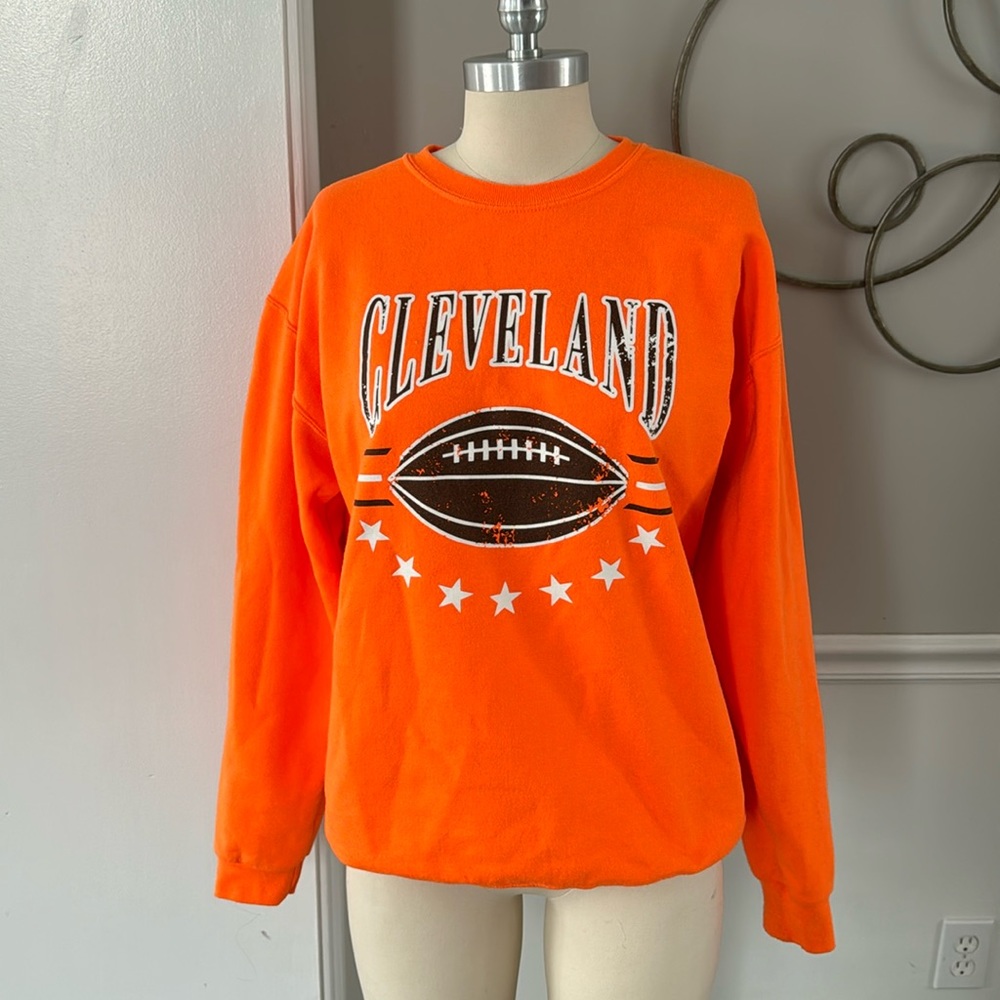 Cleveland sweatshirt, size medium, worn once, bright orange.